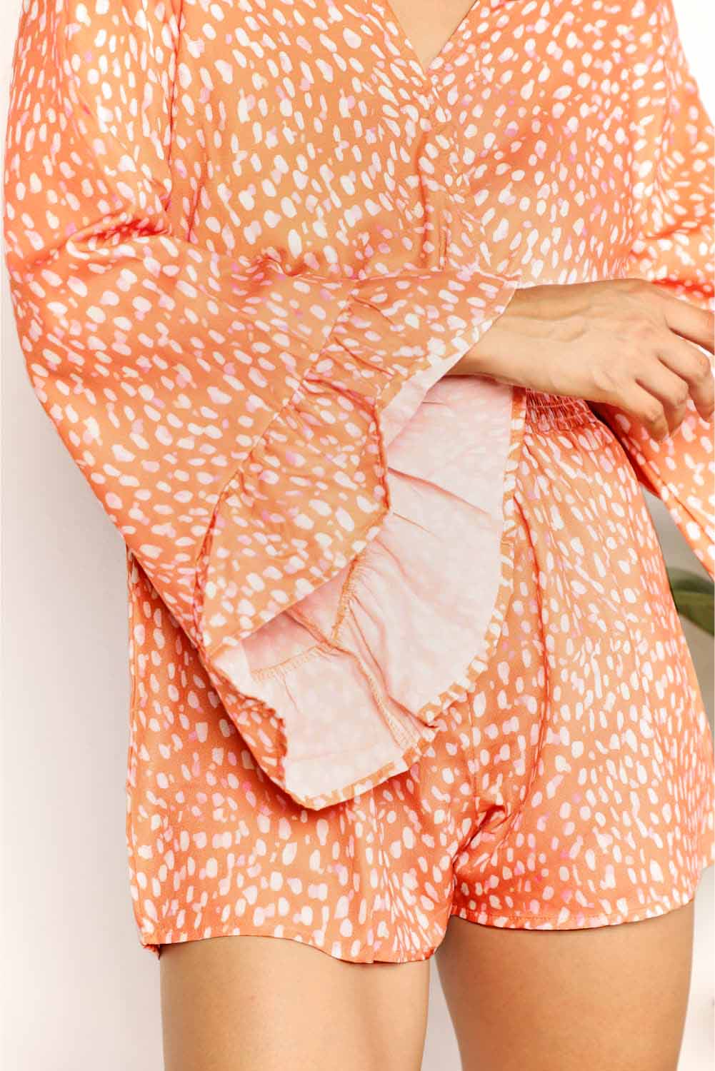 Double Take Printed Flare Sleeve Surplice Romper by Partner Label