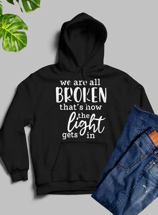 Were All Broken That's How The Light Gets In Hoodie by Merch