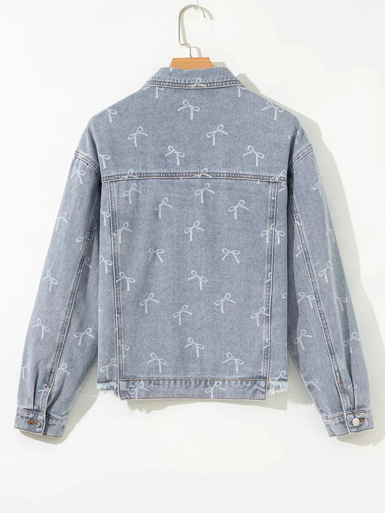 Bow Knot Print Light Wash Raw Hem Denim Jacket by Partner Label