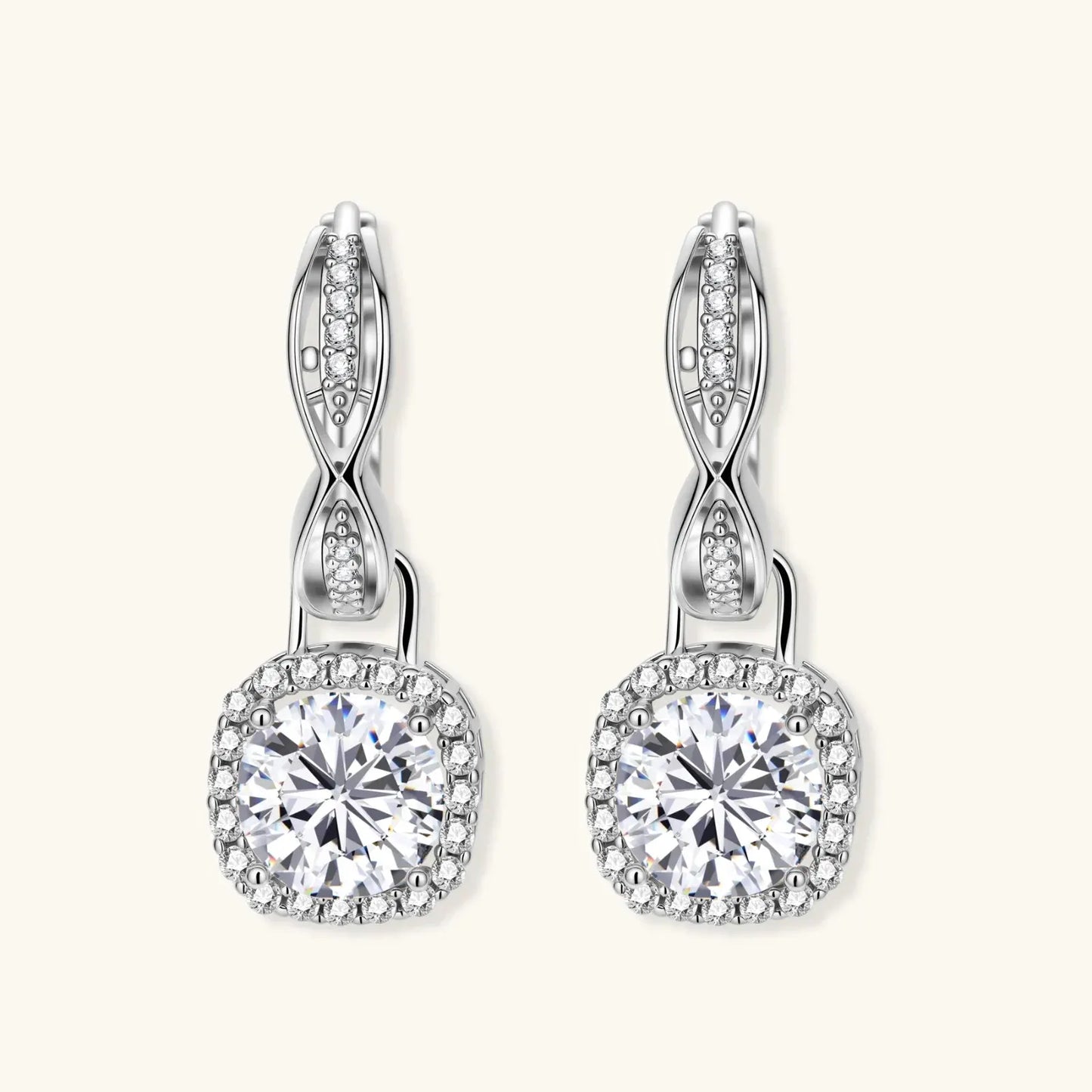Twisted Infinity Halo Moissanite Earrings | Equanimity Essence by Equanimity Essence.