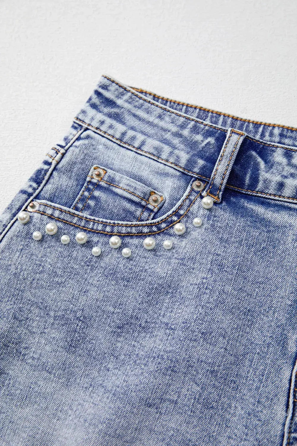 Pearl Studded Pockets Raw Hem Denim Shorts by Partner Label