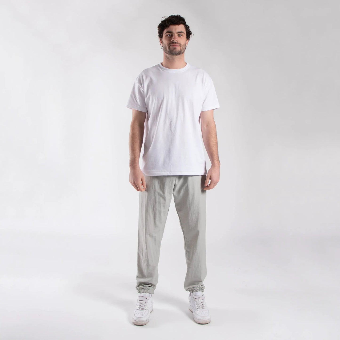 2331 - CLOSEOUT Unisex Nylon Track Pants by POS Wholesale