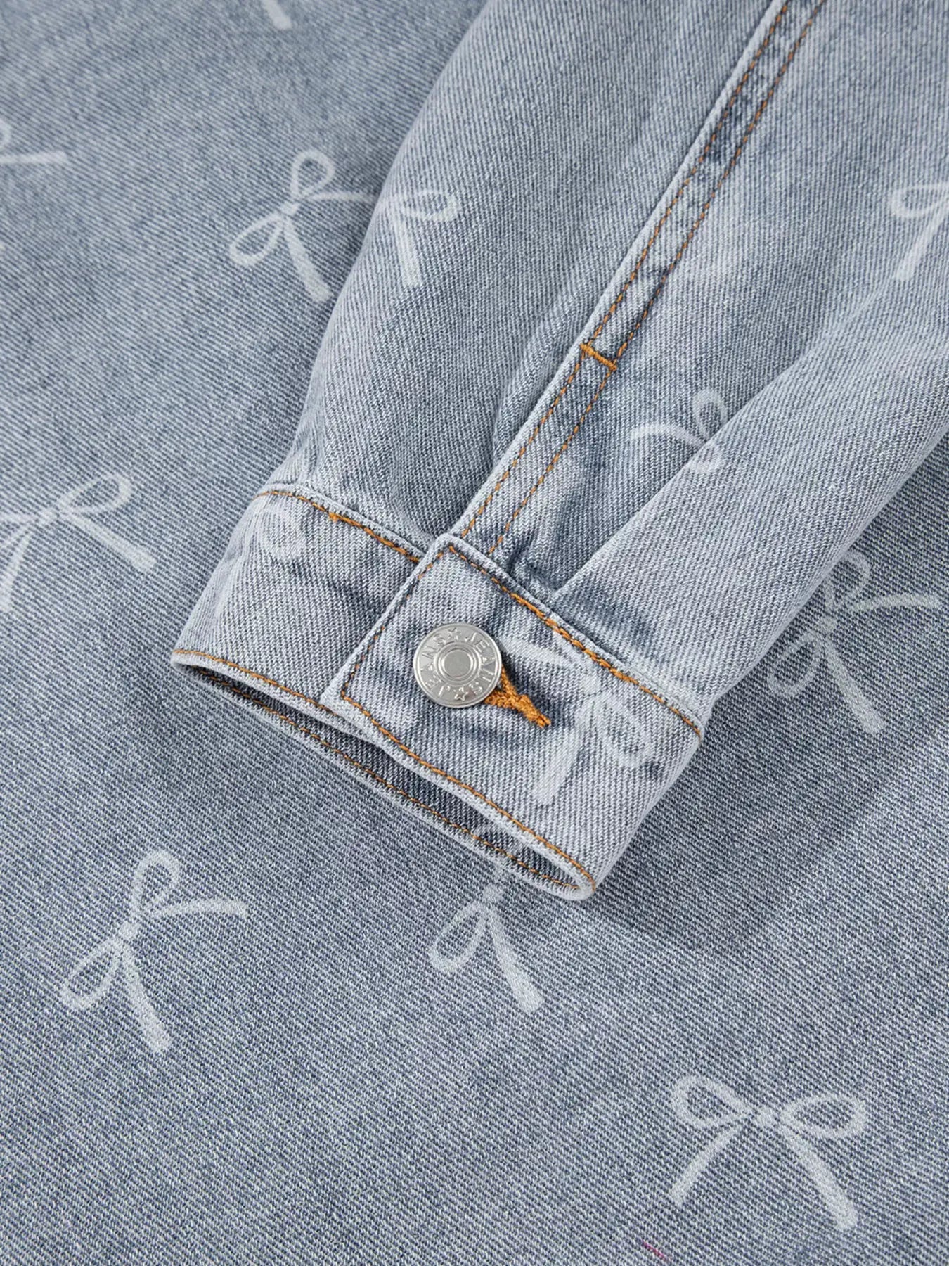 Bow Knot Print Light Wash Raw Hem Denim Jacket by Partner Label