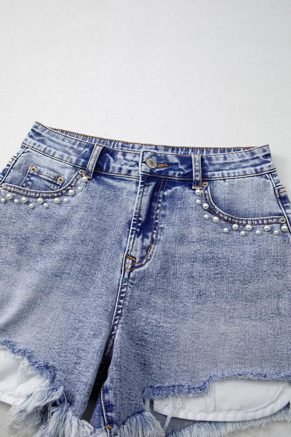Pearl Studded Pockets Raw Hem Denim Shorts by Partner Label