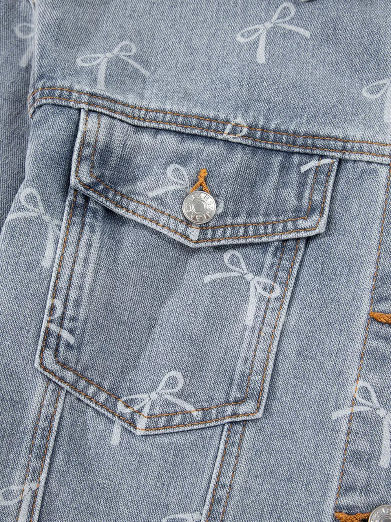 Bow Knot Print Light Wash Raw Hem Denim Jacket by Partner Label