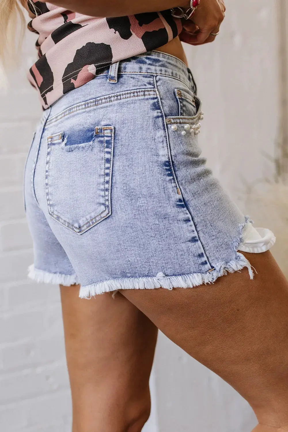 Pearl Studded Pockets Raw Hem Denim Shorts by Partner Label