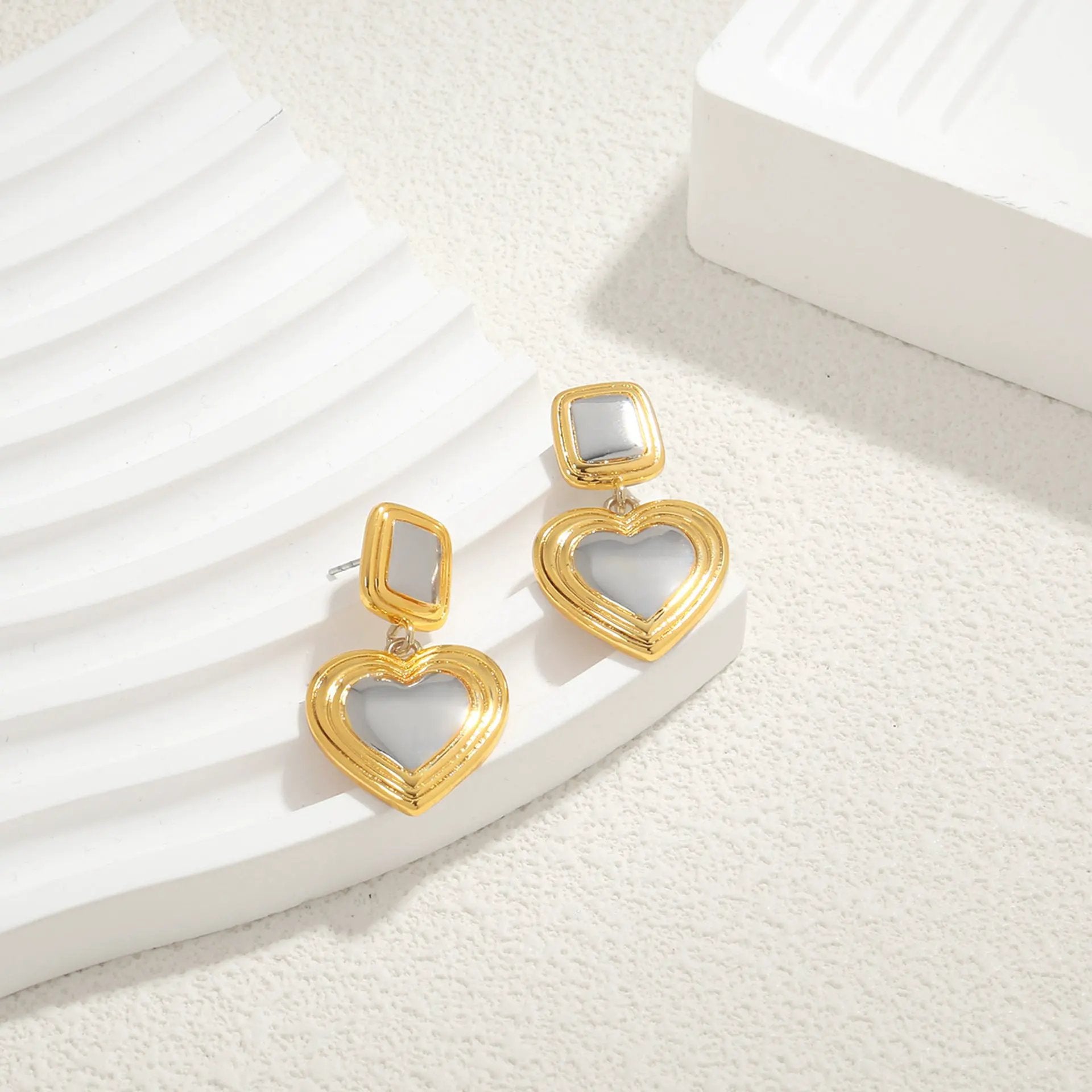 Light luxury fashion two tone earrings with a high-end feel, heart-shaped earrings with a heart shape, retro palace style peach heart earrings by Dropsure