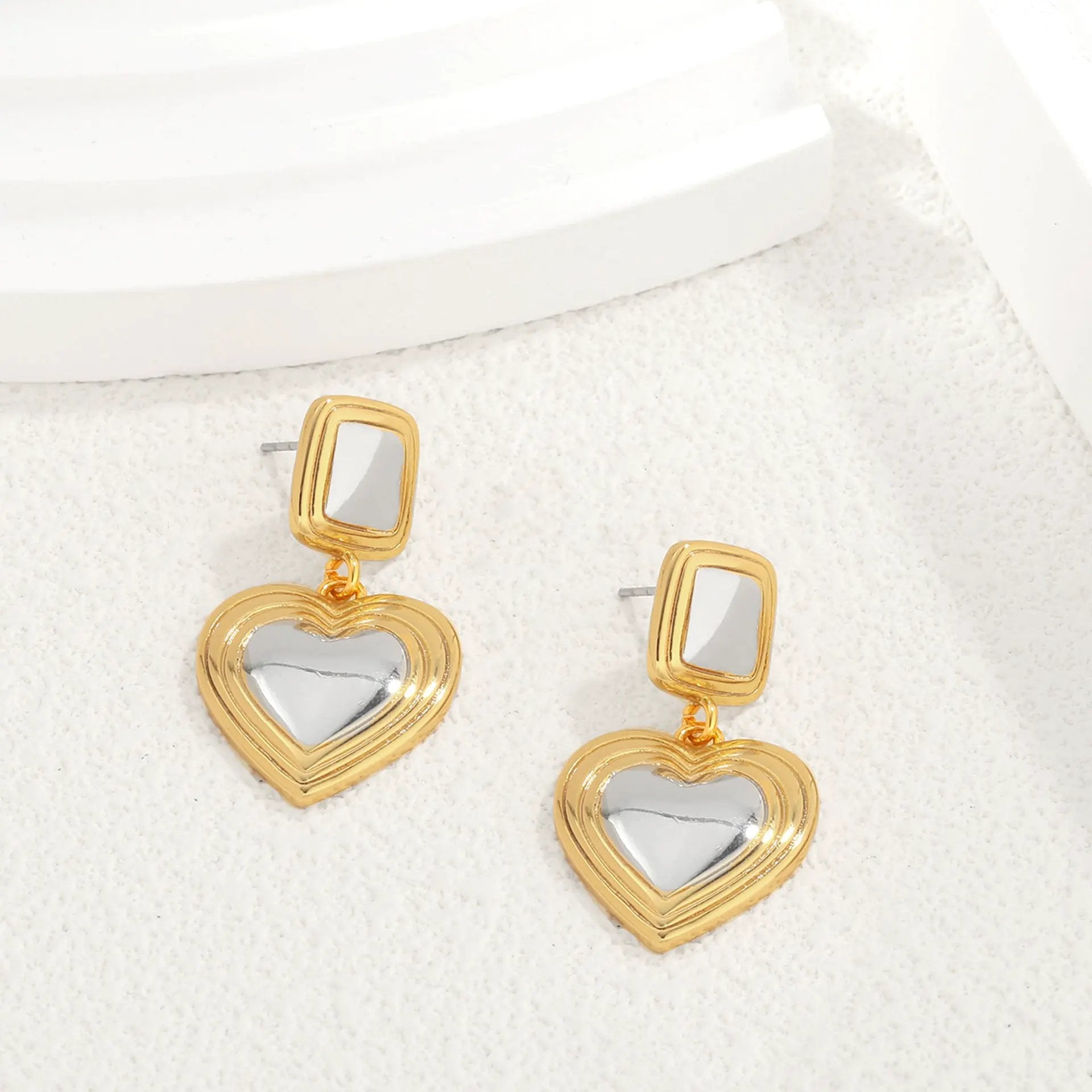 Light luxury fashion two tone earrings with a high-end feel, heart-shaped earrings with a heart shape, retro palace style peach heart earrings by Dropsure