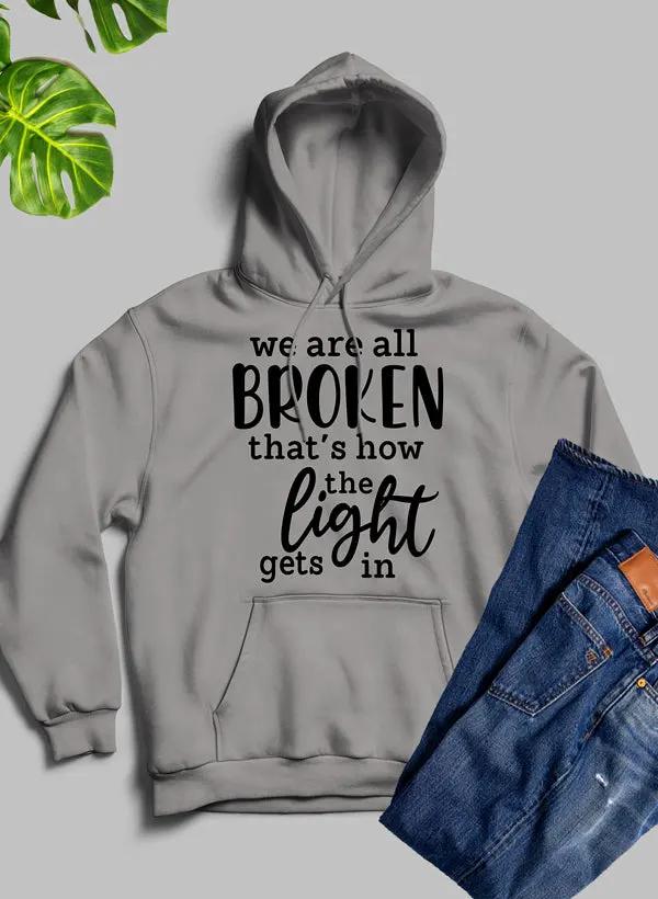 Were All Broken That's How The Light Gets In Hoodie by Merch