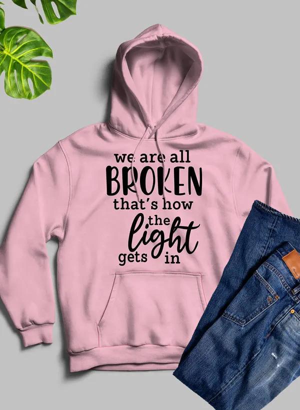 Were All Broken That's How The Light Gets In Hoodie by Merch