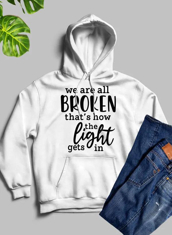 Were All Broken That's How The Light Gets In Hoodie by Merch