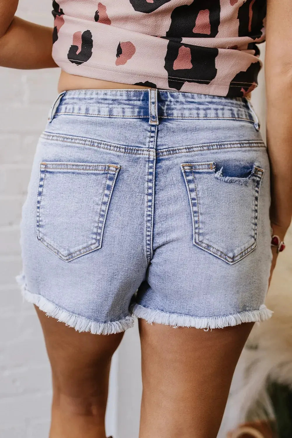Pearl Studded Pockets Raw Hem Denim Shorts by Partner Label