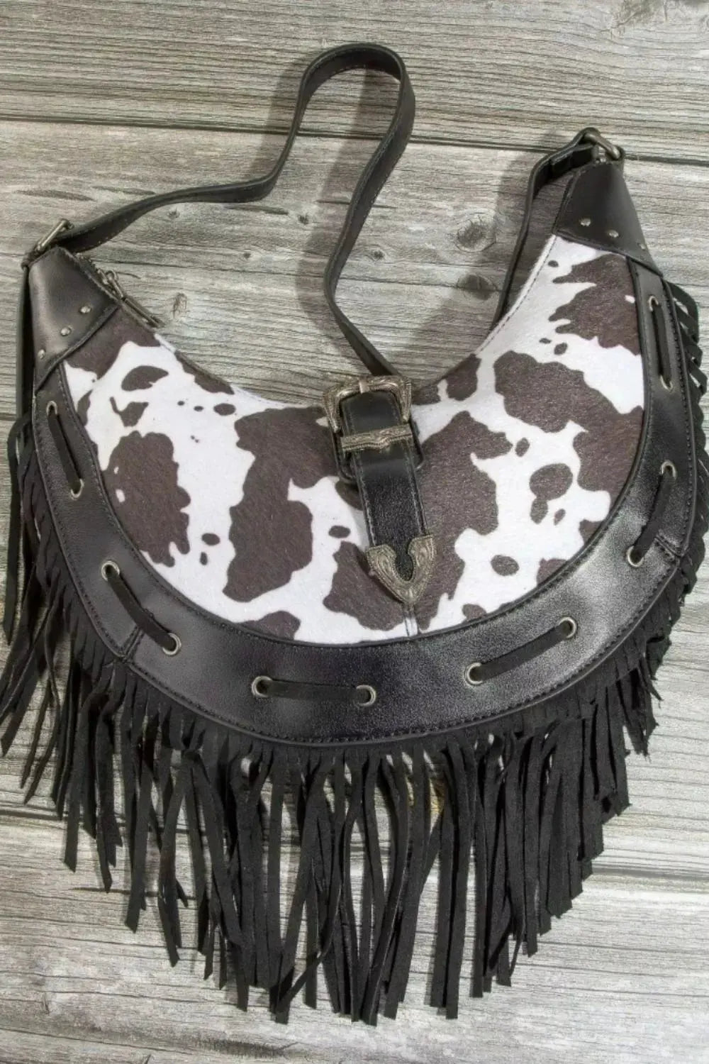 Fame Cow Print Faux Leather Fringe Hobo Bag by Fame